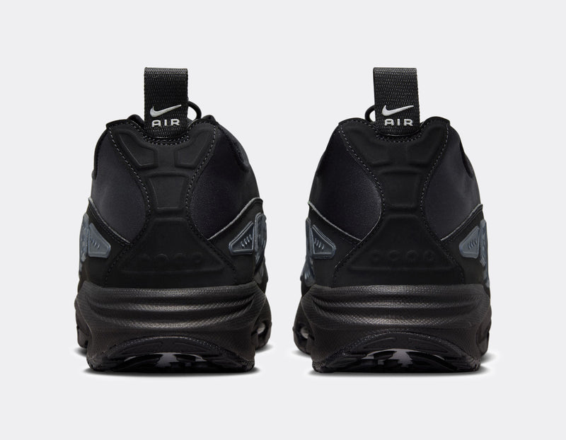 Air Max SNDR sneaker with a bold design featuring Silver accents, a black zip-up shroud, reflective design panels, Max Air cushioning in the heel, and Nike Air in the forefoot. Unzipped shroud reveals ""6453"" representing Nike’s global office numbers.