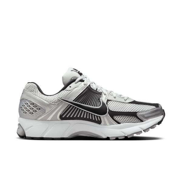Nike Zoom Vomero 5 sneaker with breathable mesh upper, Zoom Air cushioning, and retro runner design.
