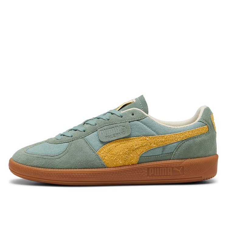 PUMA terrace sneakers with textile base, leather details, and debossed branding, combining retro charm and modern style.