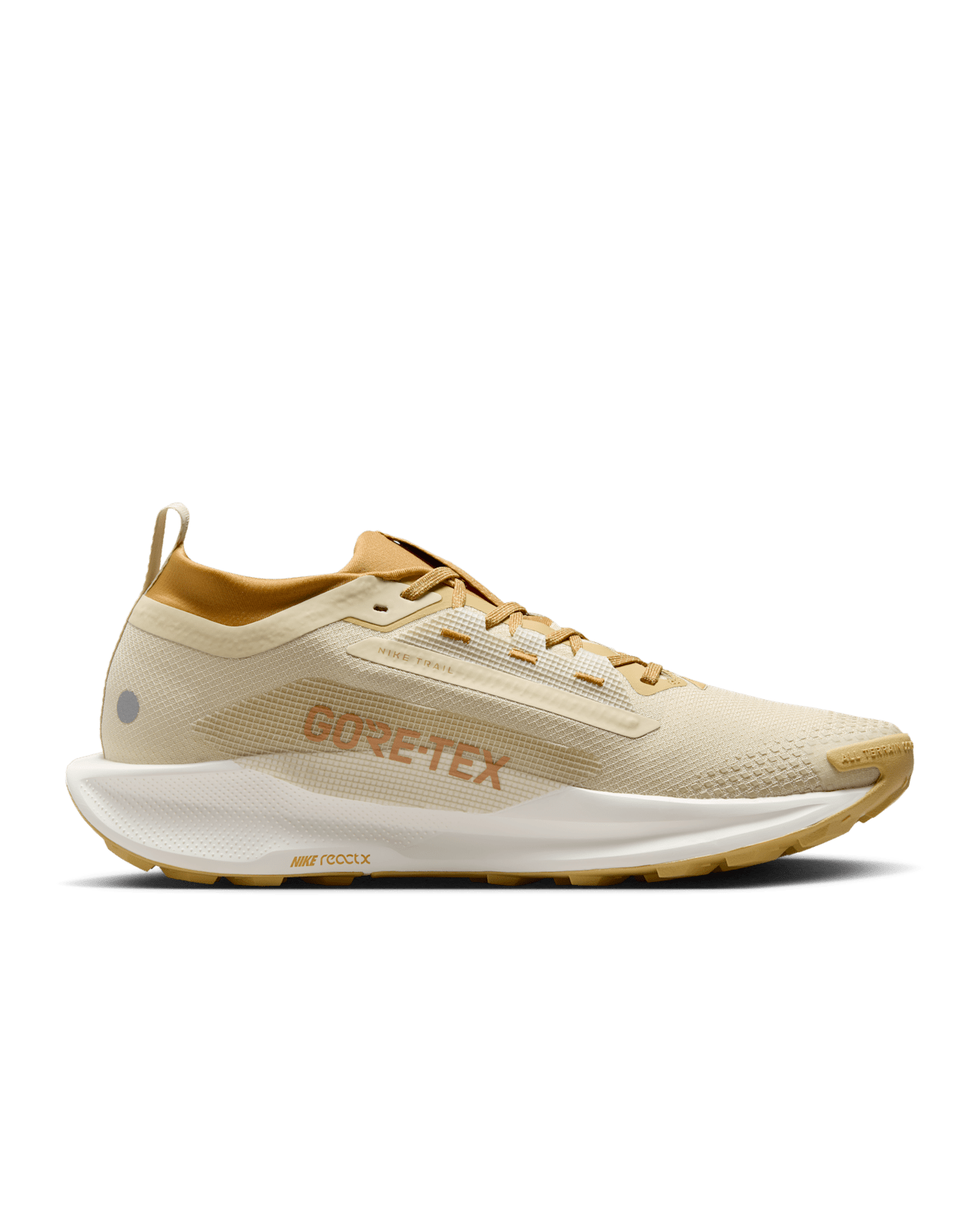 Nike Pegasus Trail 5 trail running shoe with waterproof GORE-TEX upper, ReactX foam cushioning, and rugged all-terrain outsole in Team Gold and Desert Ochre.