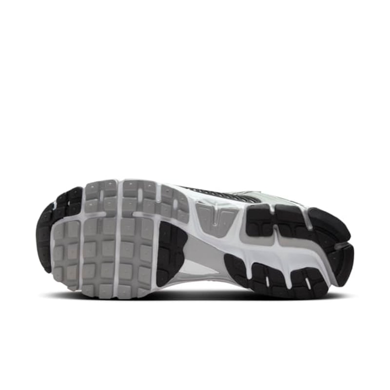 Nike Zoom Vomero 5 sneaker with breathable mesh upper, Zoom Air cushioning, and retro runner design.
