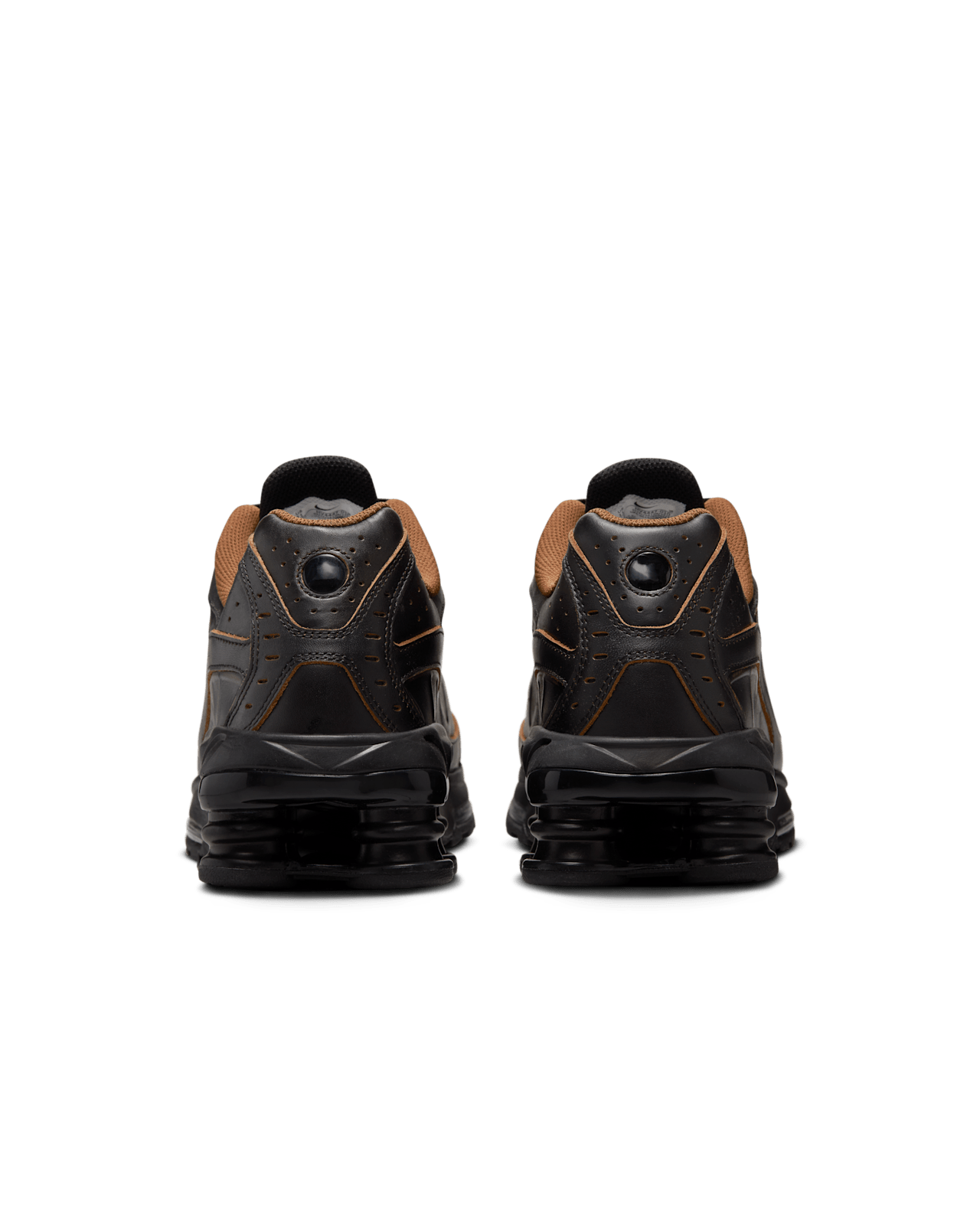Nike Shox Ride 2 sneaker featuring four Shox columns, Max Air technology, and premium genuine leather upper for durability and comfort.