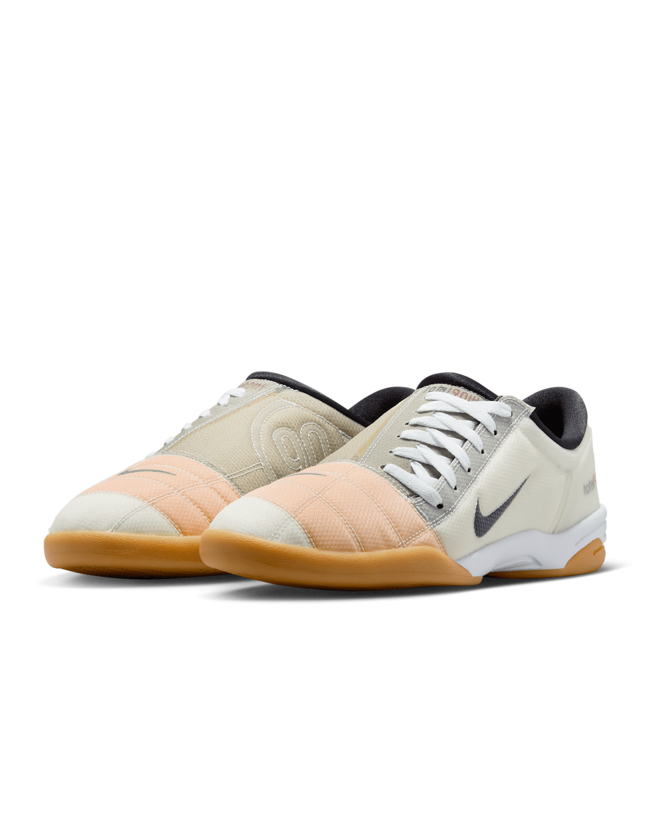 Modern Nike Total 90 with white jacquard upper, black accents, gum sole, and iconic asymmetrical lacing