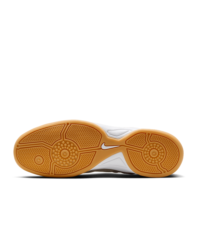 Modern Nike Total 90 with white jacquard upper, black accents, gum sole, and iconic asymmetrical lacing