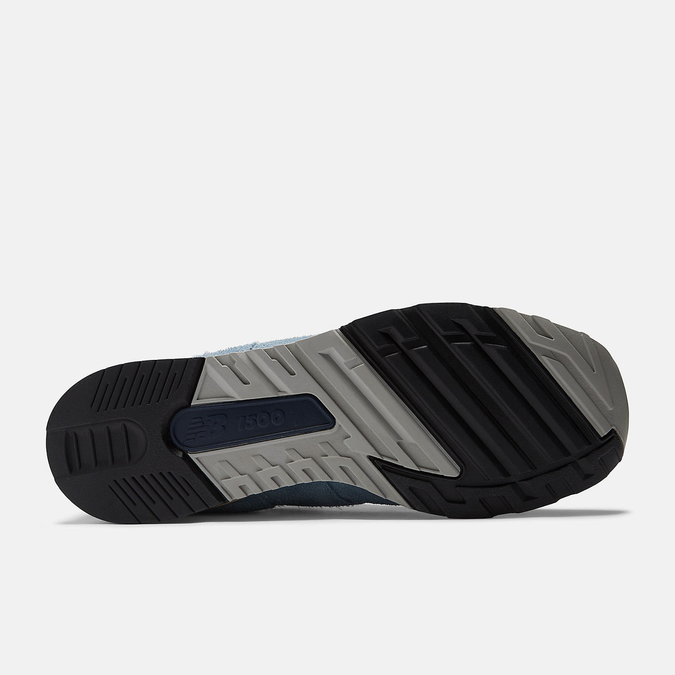 New Balance Made in UK 1500 ‘Coffee Pop’ sneaker with dark brown mesh, pale blue suede overlays, and red-orange synthetic details.