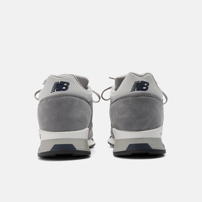 M1500 sneakers with premium synthetic nubuck, grey and navy upper, open mesh window, and contrast stitching.