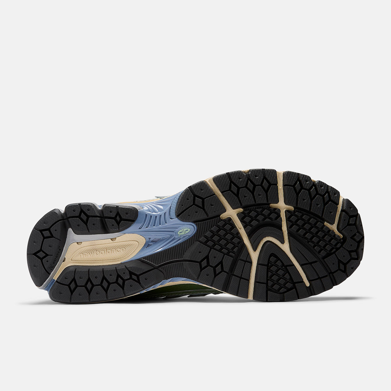 New Balance 1906R sneaker with open-holed mesh upper, curvilinear overlays, and advanced cushioning sole