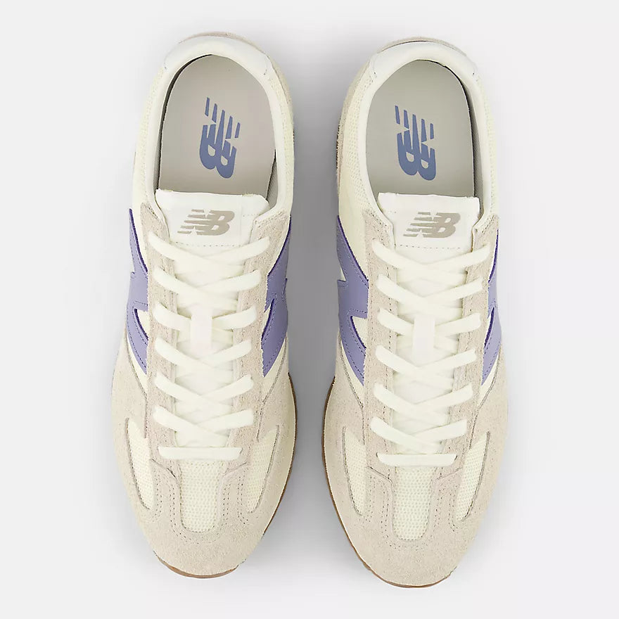 New Balance 471 sneakers featuring mesh uppers, hairy suede overlays, and a retro-inspired wedge EVA midsole.