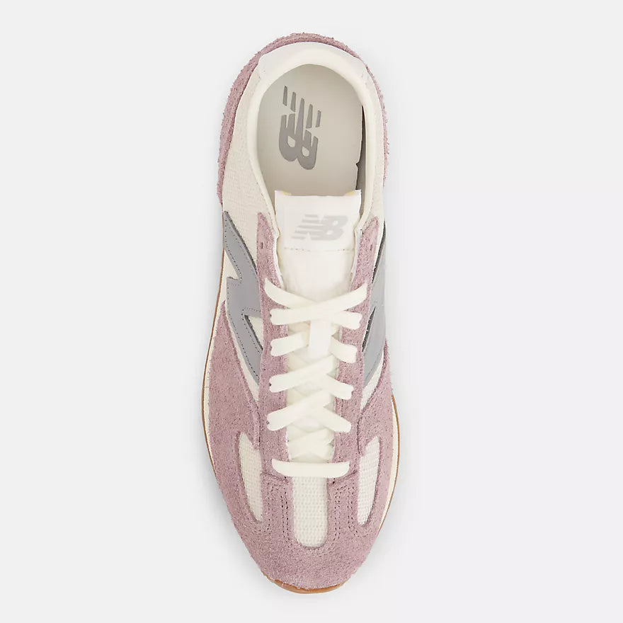 New Balance 471 sneaker with ’70s-inspired design, breathable mesh, hairy suede overlays, and fang toebox detail