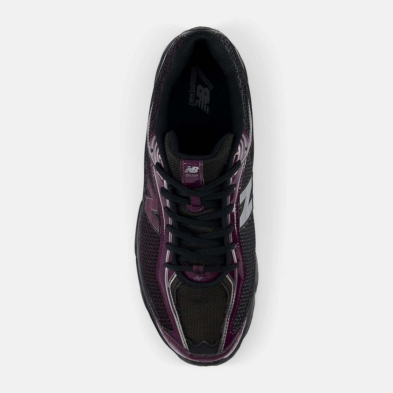 New Balance 509 sneakers with ABZORB cushioning, featuring minimalist design, mesh side panels, and vibrant Y2K-inspired colors.