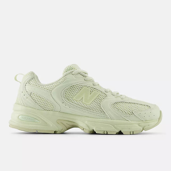 New Balance 530 sneakers with mesh and synthetic upper, ABZORB midsole, and retro-inspired running shoe silhouette.