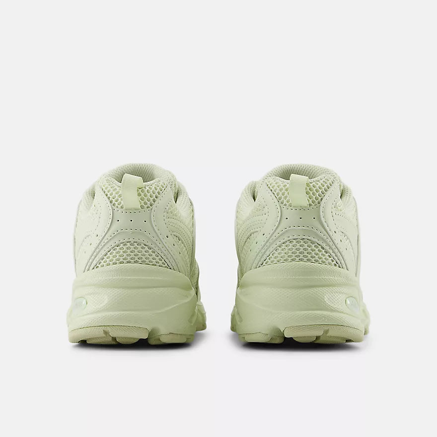 New Balance 530 sneakers with mesh and synthetic upper, ABZORB midsole, and retro-inspired running shoe silhouette.