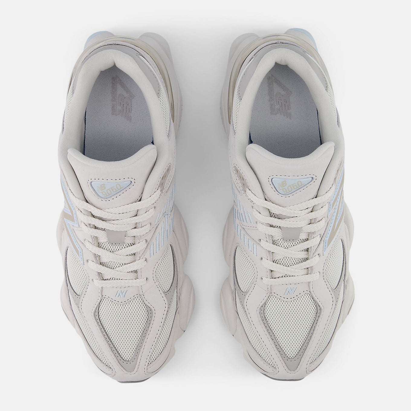 New Balance 9060 showcasing futuristic design with expanded sway bars and sculpted pod midsole.