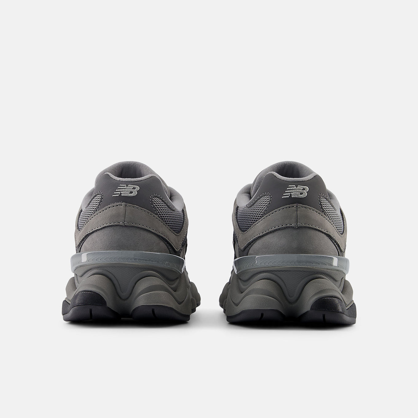 New Balance 9060 shoes featuring Y2K-inspired design, dynamic sway bars, sculpted midsole, and ABZORB and SBS cushioning platforms.