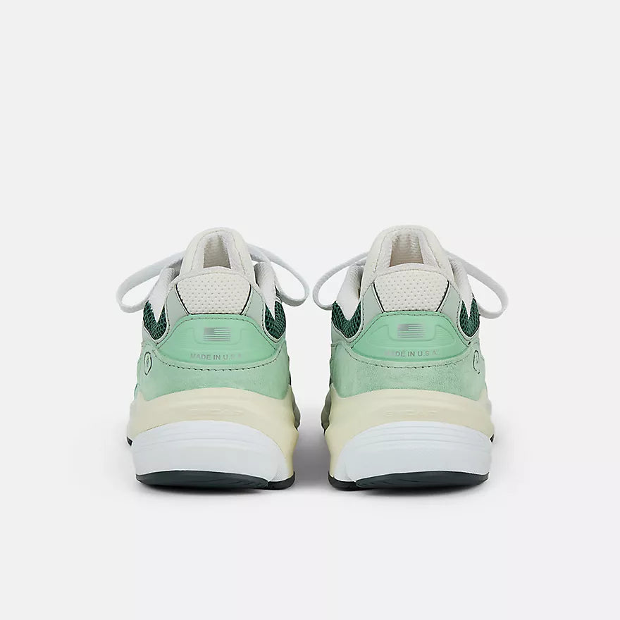 New Balance 990v6 Made in USA sneaker with avocado and mint colorway, FuelCell midsole, and streamlined suede and mesh upper design