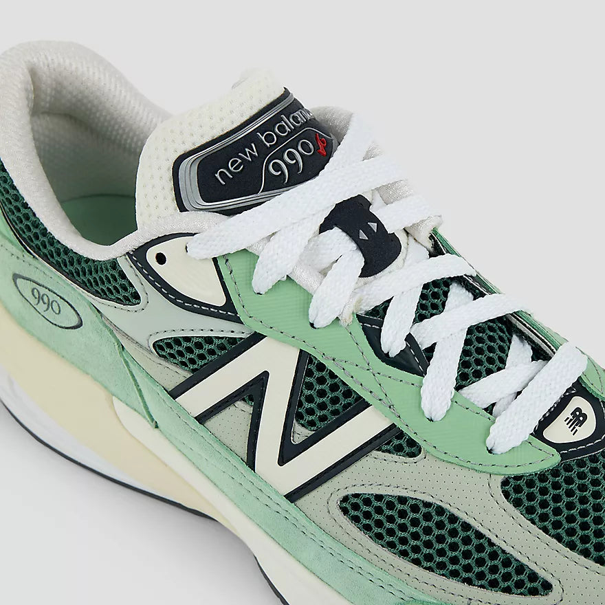 New Balance 990v6 Made in USA sneaker with avocado and mint colorway, FuelCell midsole, and streamlined suede and mesh upper design