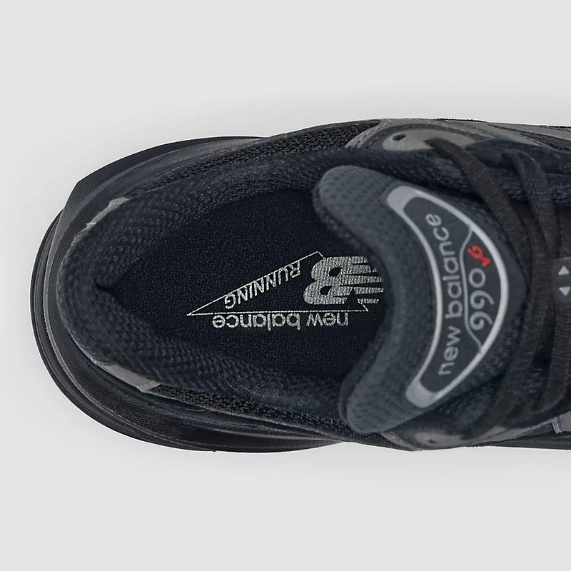 New Balance 990v6 MADE in USA with pigskin overlays, mesh upper, and FuelCell midsole in a sleek, performance-driven silhouette.