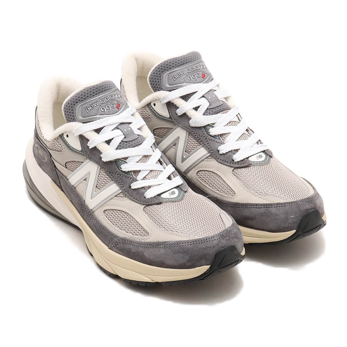 New Balance Made in USA 990v6 sneaker with a streamlined suede and mesh upper, FuelCell cushioning, and a modern grey colorway.