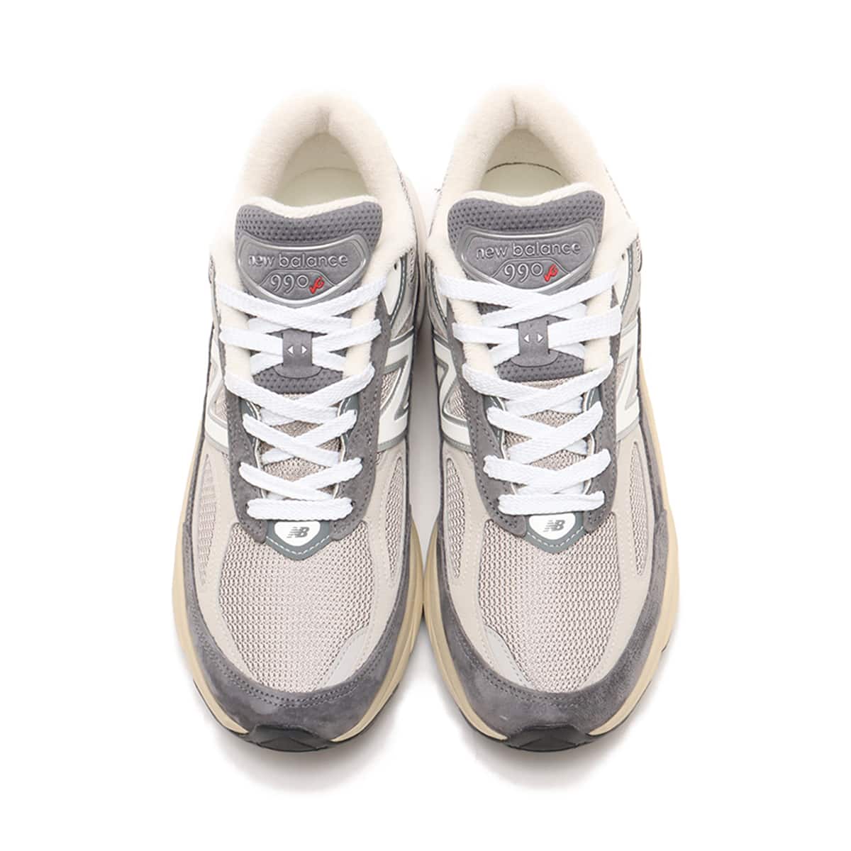 New Balance Made in USA 990v6 sneaker with a streamlined suede and mesh upper, FuelCell cushioning, and a modern grey colorway.
