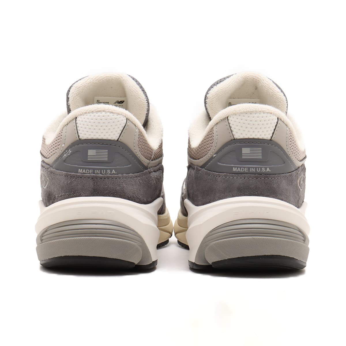 New Balance Made in USA 990v6 sneaker with a streamlined suede and mesh upper, FuelCell cushioning, and a modern grey colorway.