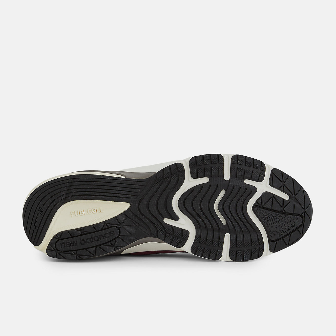 New Balance Made in USA 990v6 sneaker with a streamlined suede and mesh upper, FuelCell cushioning, and a modern grey colorway.