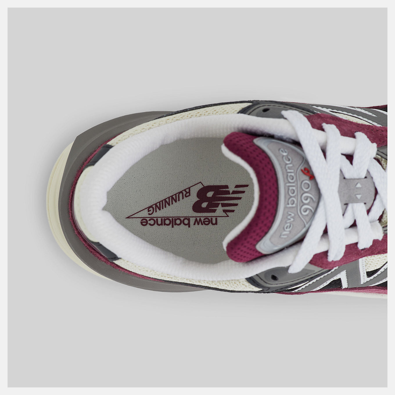 New Balance Made in USA 990v6 sneaker with a streamlined suede and mesh upper, FuelCell cushioning, and a modern grey colorway.