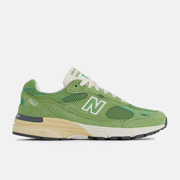 New Balance 993 from the MADE in USA Seasonal Collection, featuring a mesh upper overlaid with premium nubuck in 'chive' green, atop a dual-color white and off-white midsole.