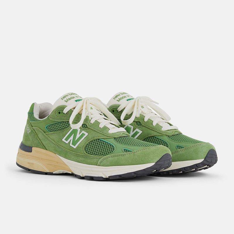 New Balance 993 from the MADE in USA Seasonal Collection, featuring a mesh upper overlaid with premium nubuck in 'chive' green, atop a dual-color white and off-white midsole.