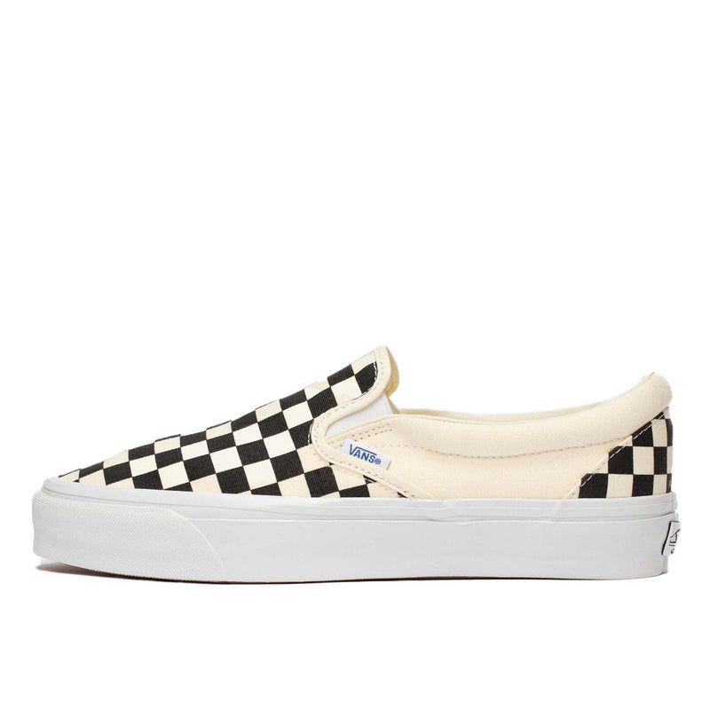 Premium Slip-On 98 Shoes featuring a checkerboard print, full-grain leather collar lining, gloss-finished sidewalls, and Sola Foam All-Day-Comfort.