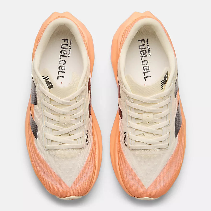 New Balance FuelCell Rebel v4 running shoe with a lightweight mesh upper, responsive FuelCell cushioning, and a sleek, race-inspired design.