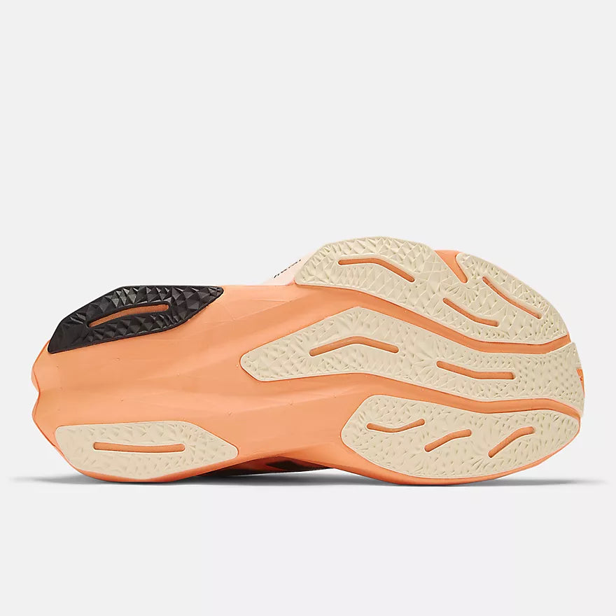 New Balance FuelCell Rebel v4 running shoe with a lightweight mesh upper, responsive FuelCell cushioning, and a sleek, race-inspired design.