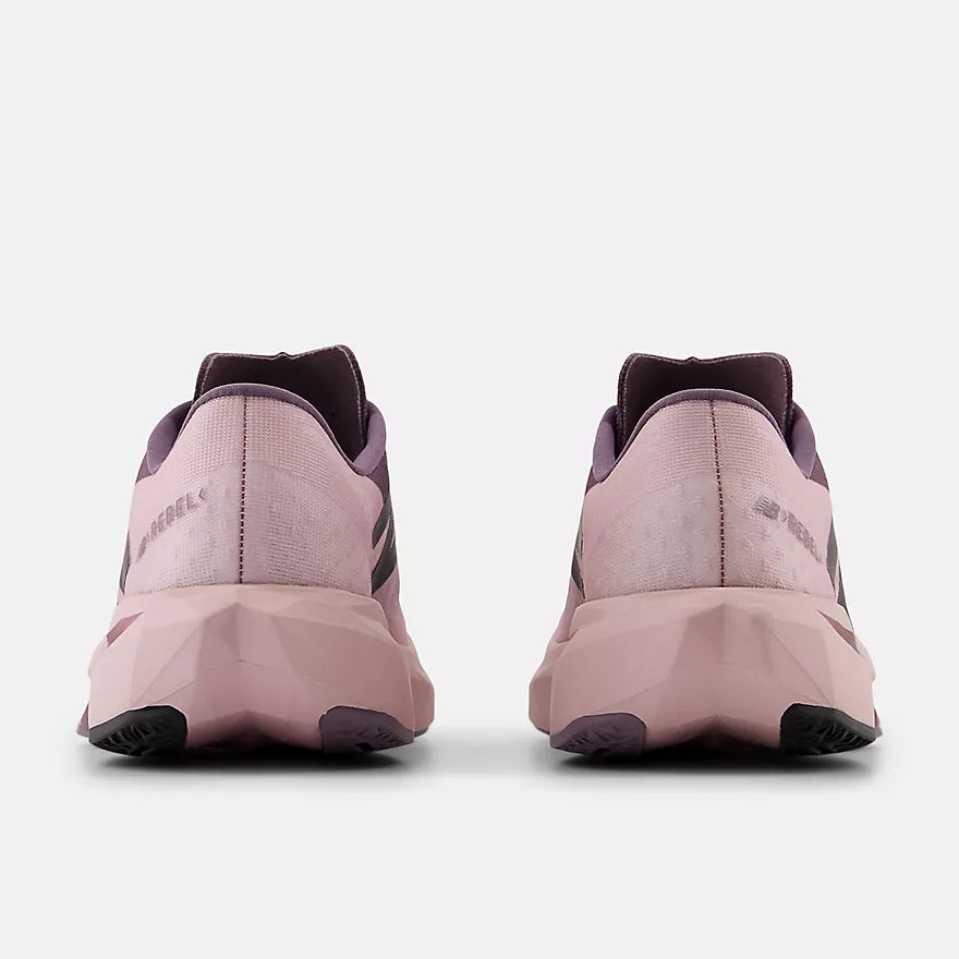 New Balance FuelCell Rebel v4 running shoes with streamlined mesh upper and responsive midsole cushioning.