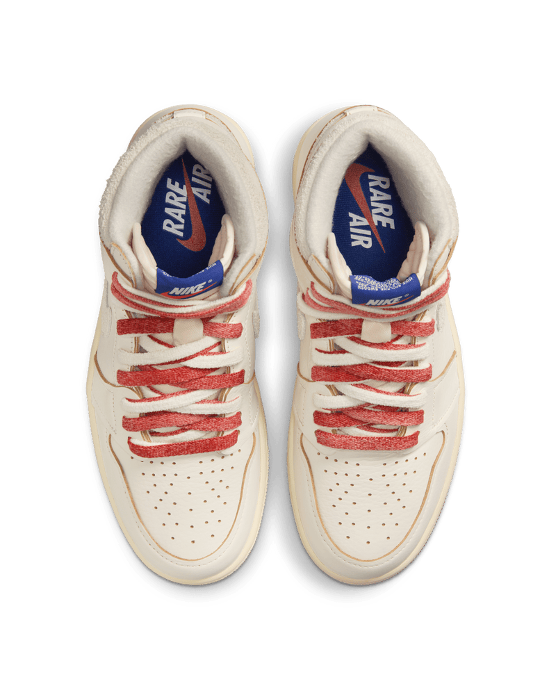 Air Jordan 1 "Rare Air" sneakers with suede Swooshes and Deep Royal Blue “NIKE AIR” label, honoring original AJ1 sample imperfections.
