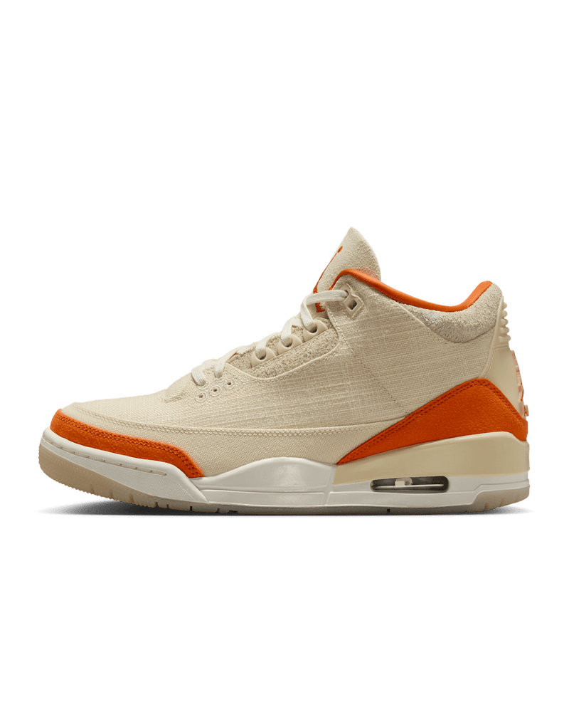 Women’s Air Jordan 3 sneakers in neutral canvas and suede with orange accents, inspired by MJ’s legendary backboard-shattering exhibition game in Italy.