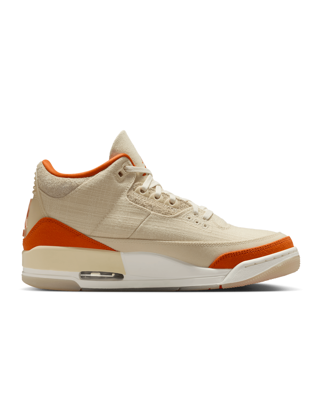 Women’s Air Jordan 3 sneakers in neutral canvas and suede with orange accents, inspired by MJ’s legendary backboard-shattering exhibition game in Italy.