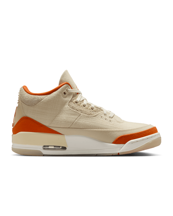 Women’s Air Jordan 3 sneakers in neutral canvas and suede with orange accents, inspired by MJ’s legendary backboard-shattering exhibition game in Italy.