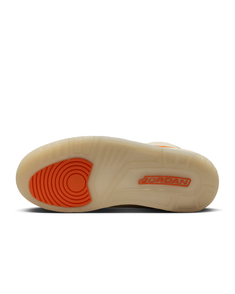 Women’s Air Jordan 3 sneakers in neutral canvas and suede with orange accents, inspired by MJ’s legendary backboard-shattering exhibition game in Italy.