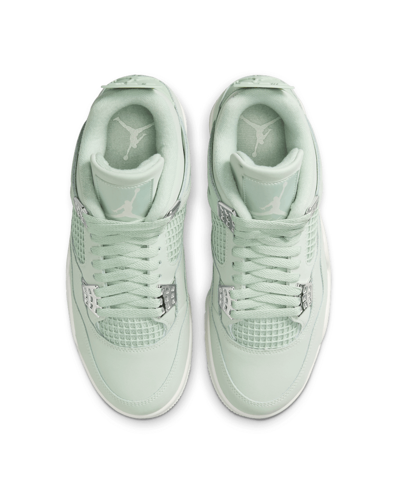 AJ4 'Abundance' sneakers in Seafoam and Sail colorway with Metallic Silver accents.