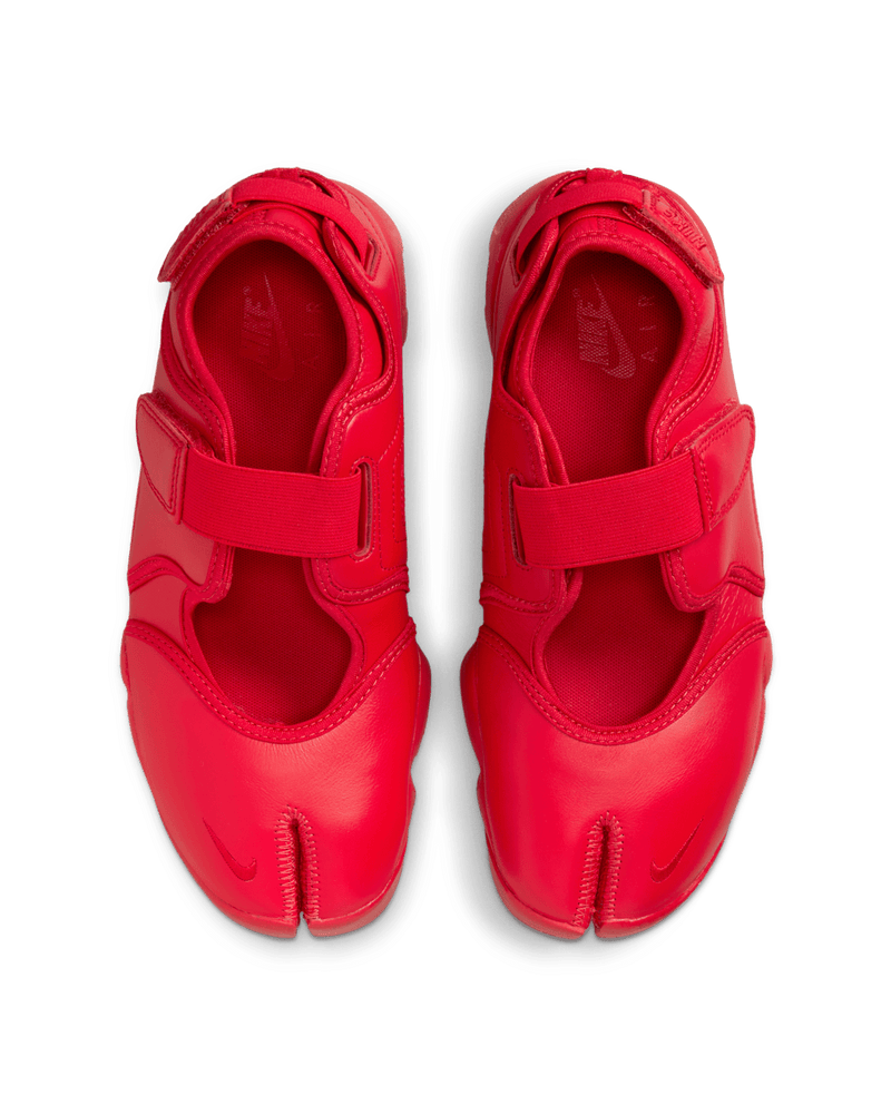 Air Rift Pure Platinum sneaker-sandal hybrid with full-grain leather upper, adjustable straps, split-toe design, and plush foam midsole with Air cushioning.