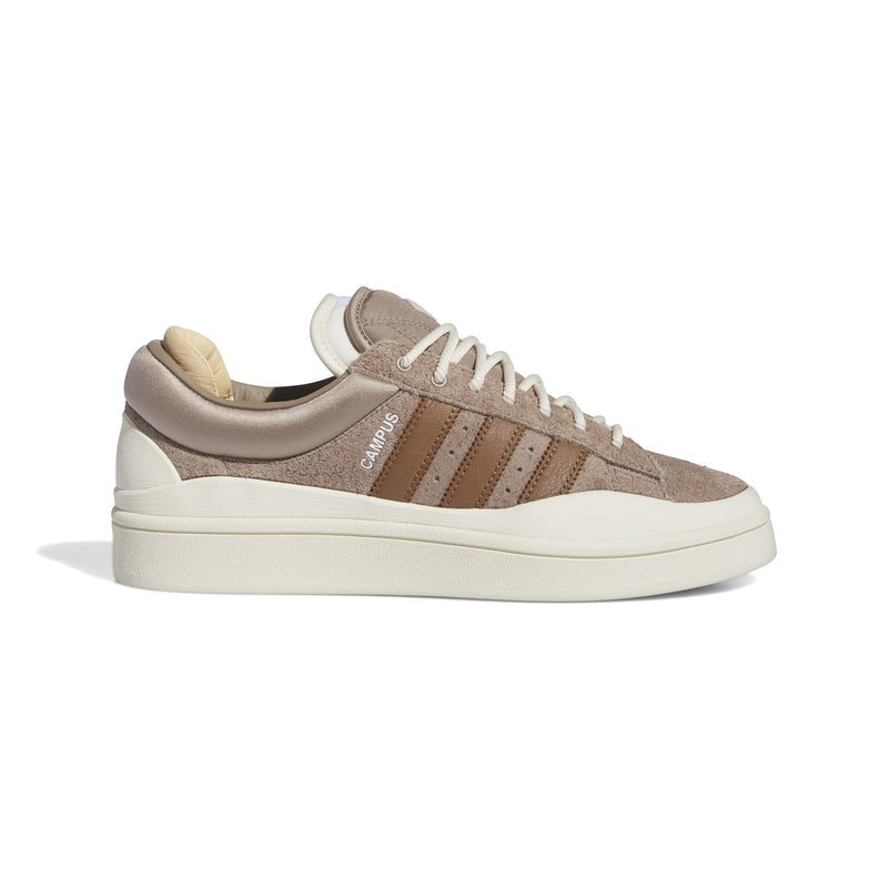 Contoured outsoles. Bold 3-Stripes. And casual style for days. These adidas Campus shoes uphold everything you love about the classic Campus design, but this time with the unmistakable look of a Bad Bunny collaboration. A smooth leather upper conforms to your foot, and a soft interior lining keeps every step comfortable.