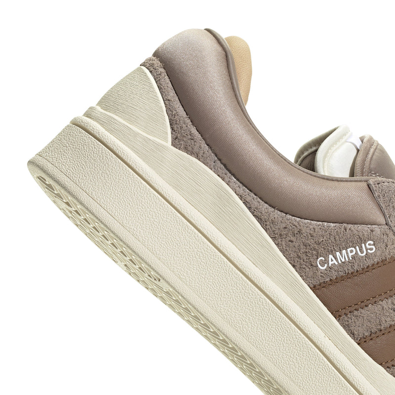 Contoured outsoles. Bold 3-Stripes. And casual style for days. These adidas Campus shoes uphold everything you love about the classic Campus design, but this time with the unmistakable look of a Bad Bunny collaboration. A smooth leather upper conforms to your foot, and a soft interior lining keeps every step comfortable.