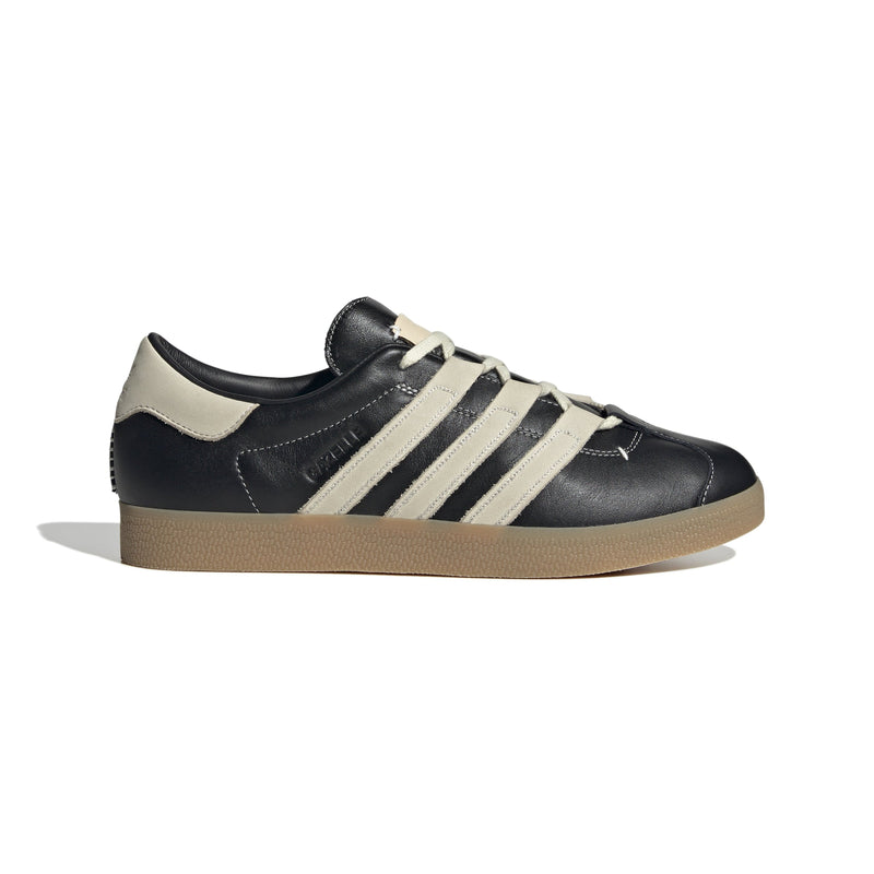 Adidas sneakers and apparel showcasing a blend of innovation, quality, and iconic design, featuring classic styles like Stan Smith alongside modern performance gear, perfect for sports and streetwear.