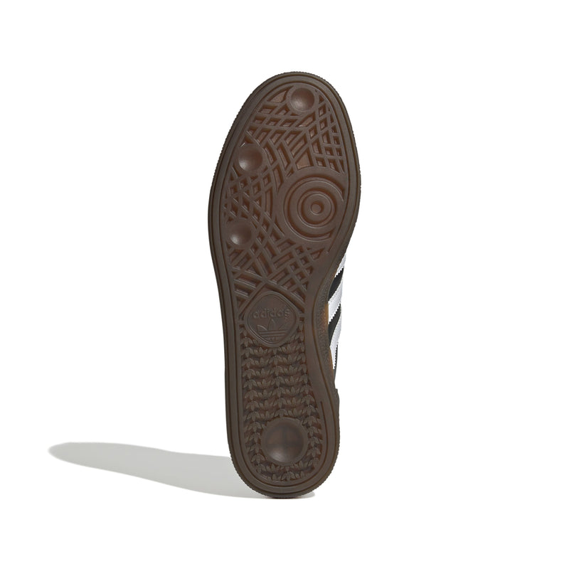 adidas Handball Spezial shoes featuring a sleek design with a T-shaped toebox, serrated 3-Stripes, soft leather upper, and gold foil details.