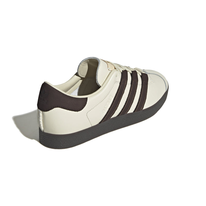 adidas Gazelle shoes in collaboration with Foot Industry, featuring a premium leather upper, molded sockliners for comfort, decorative leather tongue label, co-creation logo on the heel, and durable rubber outsole.