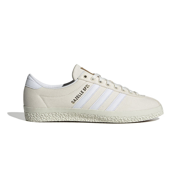 Gazelle shoes featuring a low-top design with a white denim upper, complemented by a leather lining for comfort and a rubber outsole for stability.