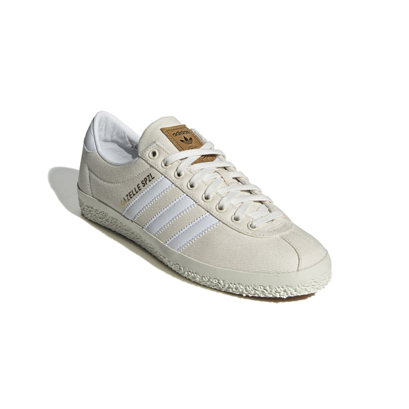 Gazelle shoes featuring a low-top design with a white denim upper, complemented by a leather lining for comfort and a rubber outsole for stability.