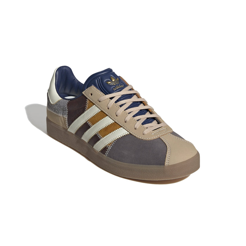 adidas Gazelle 85 shoes showcasing the smooth leather and soft suede accents in a classic, retro-inspired design.