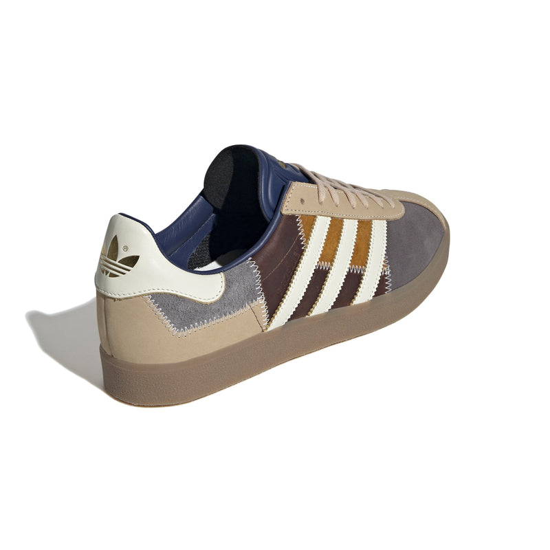 adidas Gazelle 85 shoes showcasing the smooth leather and soft suede accents in a classic, retro-inspired design.