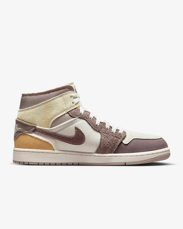 AJ1 Mids - Inside out craftsmanship with layered construction and artisan finish.
