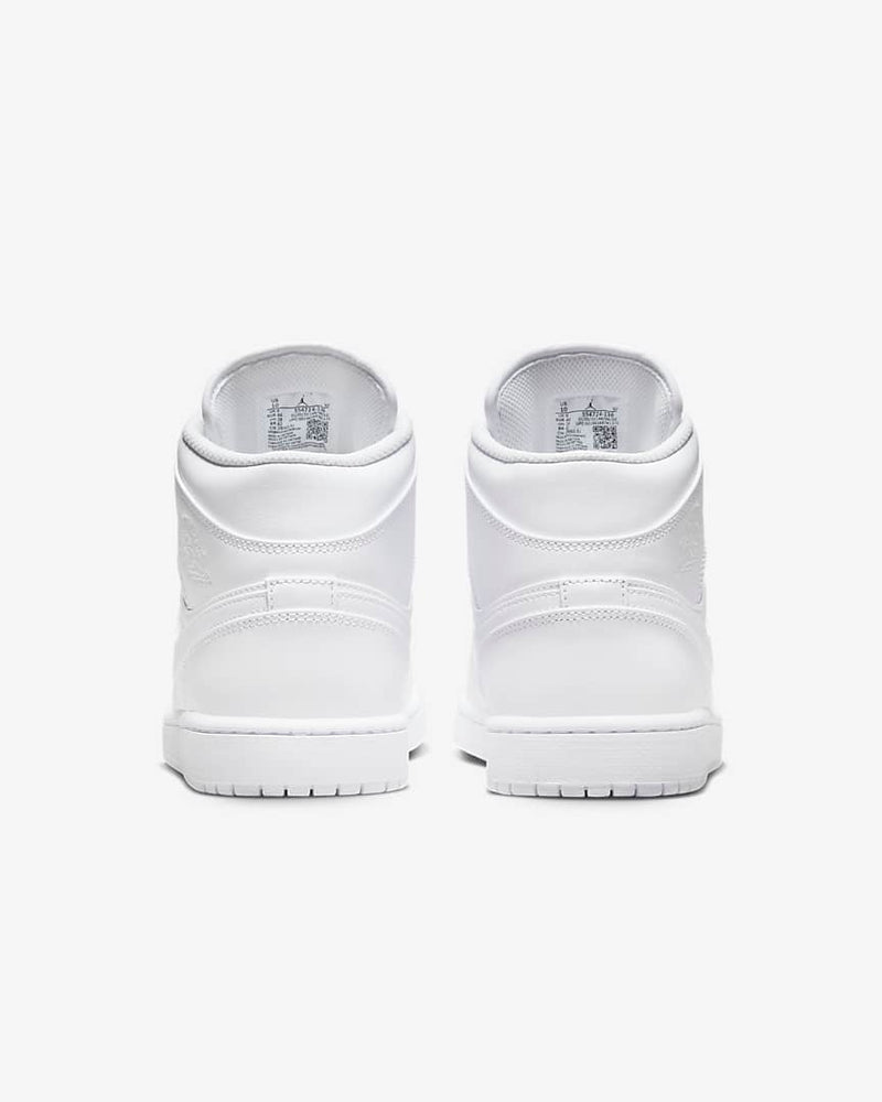 Nike Air Jordan 1 Mid Triple White shoe - Classic design meets modernity in a fresh white colorway.